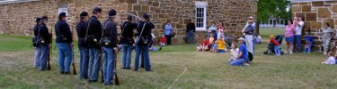 Photograph of weapons firing demonstration.